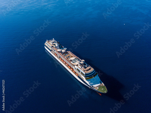 Top view from drone on cruise liner in the blue sea