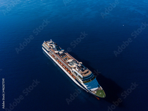 Top view from drone on cruise liner in the blue sea