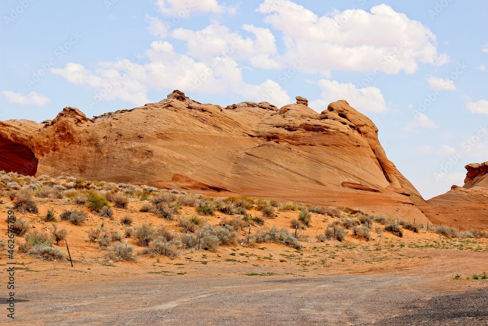 Smooth Rock Formation Protruding From High Desert