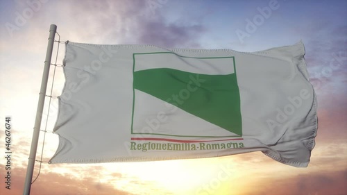 Emilia-Romagna flag, Italy, waving in the wind, sky and sun background photo