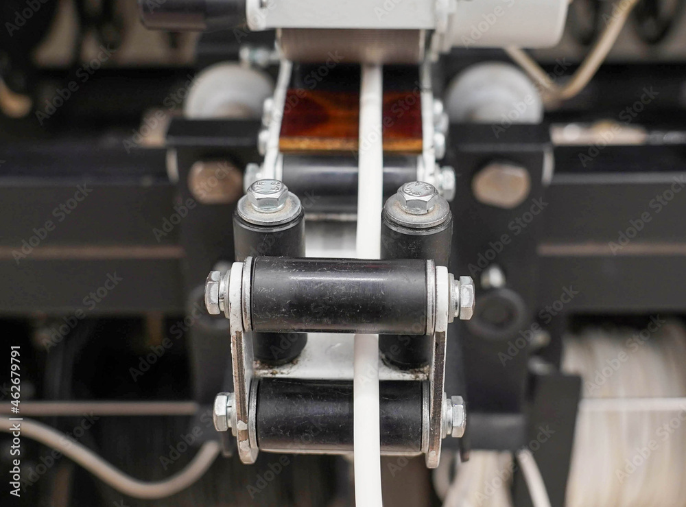 Close-up photo of a black and white machine Close-up photo of a black and white machine