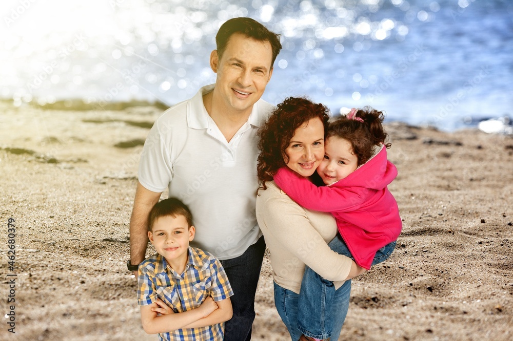 Happy family together on the beach in the holiday. Happy family together on the beach in the holiday.