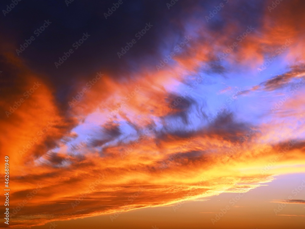 beautiful evening sky in bright colors of torn clouds, beauty in the nature of sunset heavenly space, twilight high sky at golden hour, natural landscape of stormy cloudy skies