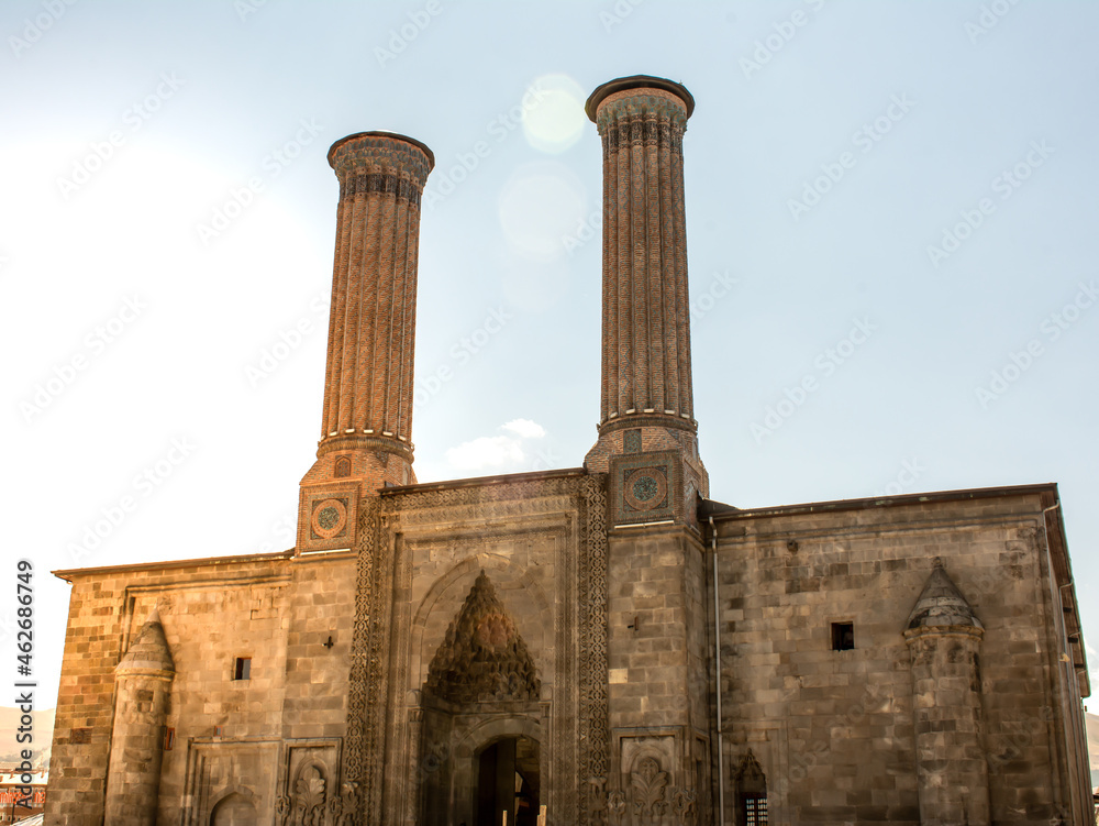 The Twin Minaret Madrasa in Erzurum. Symbol historical building of Erzurum province. Madrasa built during the Seljuk Empire. Selective focus.