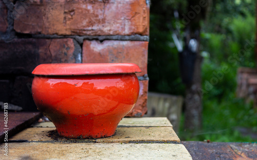 Red pot on the stove © focusofattention