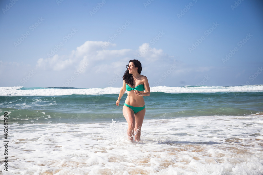 Happy woman at seaside, Fuerteventura, Spain Happy woman at seaside, Fuerteventura, Spain