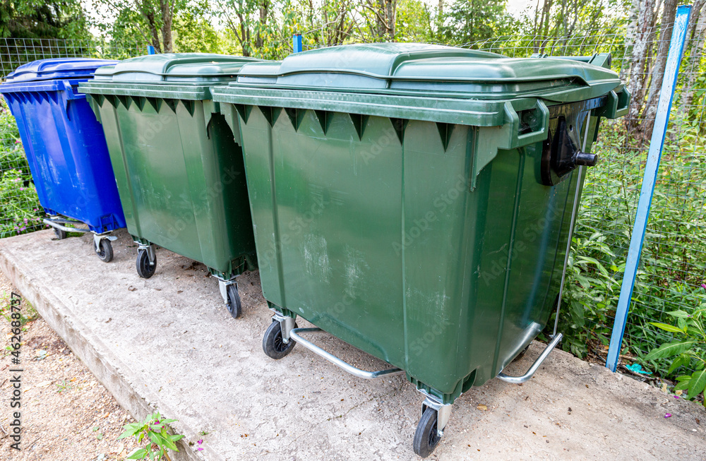 Plastic garbage containers at the outdoors Plastic garbage containers at the outdoors