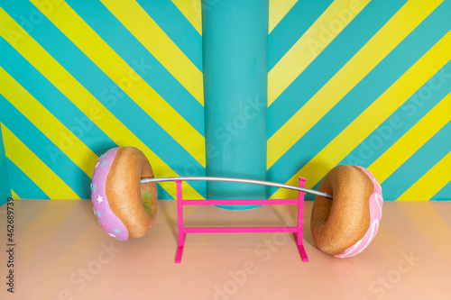 Oversized donuts as barbell at an indoor theme park