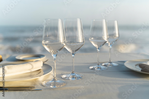 Spain, Empty wineglasses on set restaurant table photo