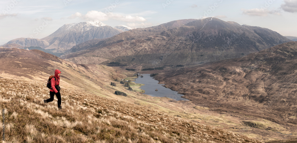 UK, Scotland, Onich, Beinn Na Gucaig, woman hiking in mountain scenery UK, Scotland, Onich, Beinn Na Gucaig, woman hiking in mountain scenery