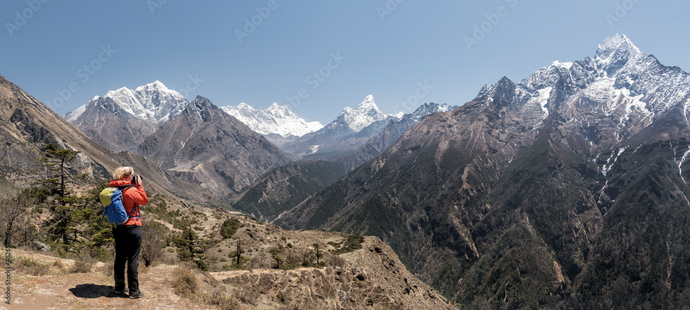 Woman hiking the Everest Base Camp trek, Himalayas, Solo Khumbu, Nepal