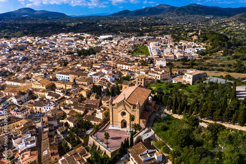 Townscape with parish church Transfiguracio del Senyor, Arta, Majorca, Spain photo