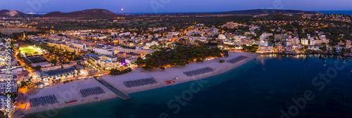 Spain, Balearic Islands, Mallorca, Calvia region, Aerial view over Costa de la Calma and Santa Ponca with hotels and beaches at dusk