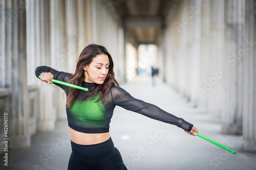 Young woman doing pound fitness exercise photo