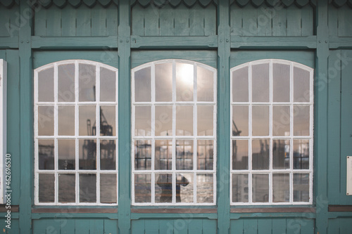 Germany, Hamburg, Ovelgonne, Port on river Elbe reflected in window photo