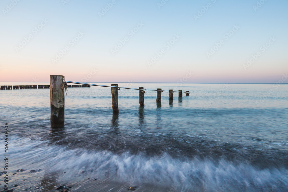 Germany, Mecklenburg-Western Pomerania, Baltic Sea, breakwater, beach in the evening Germany, Mecklenburg-Western Pomerania, Baltic Sea, breakwater, beach in the evening