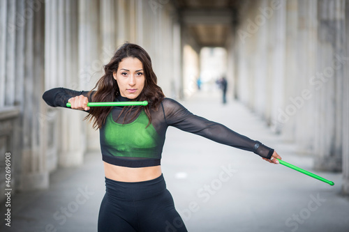 Young woman doing pound fitness exercise