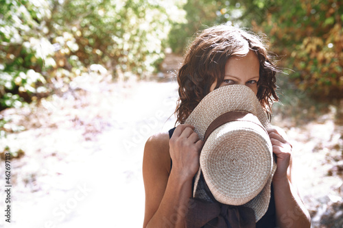 Portrait of flirty woman in nature
