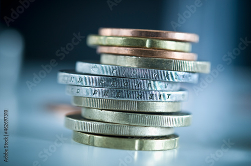 Stack of euro coins with inscriptions 'Unity', 'Law' and 'Freedom'