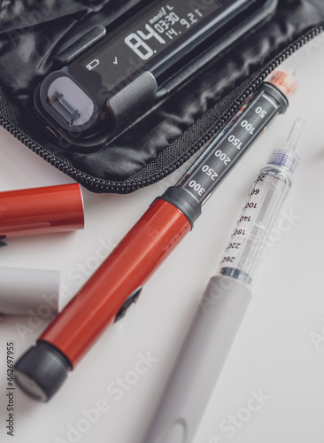 Medicine, diabetes, glycemia, healthcare and people concept. Insulin and blood sugar meter, diabetes kit . World Diabetes day, 14 November