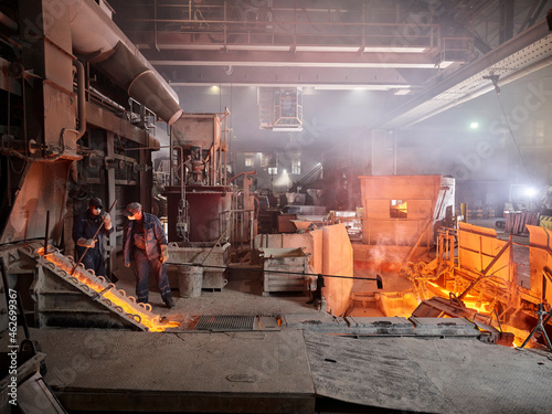 Industry, Workers controlling smelting process