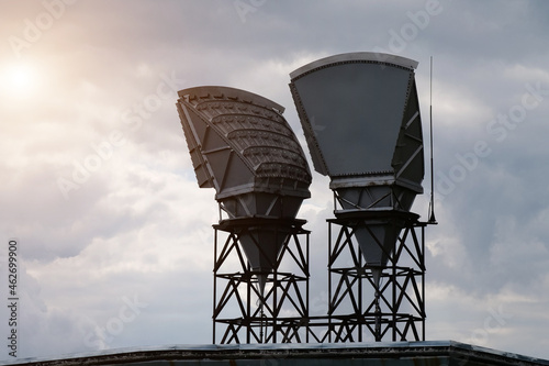 Horn antennas and clouds background