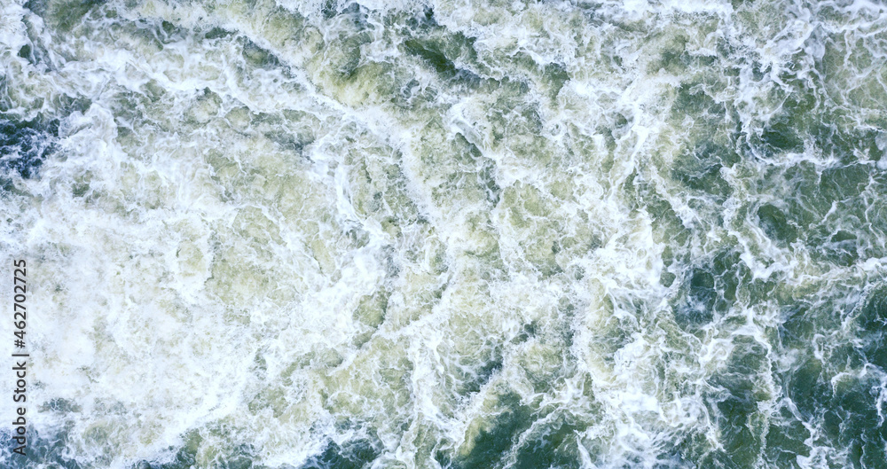 Strong swirl of water for the background. Water waves