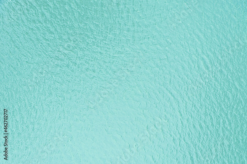 Blue water surface for background. Small waves on the water