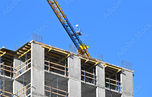 Crane and highrise construction site