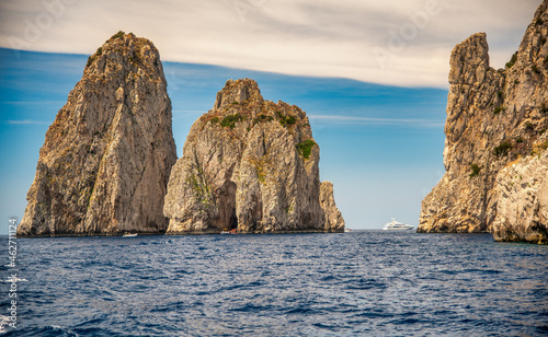 View of famous Faraglioni rocks from the sea, Capri - Italy.