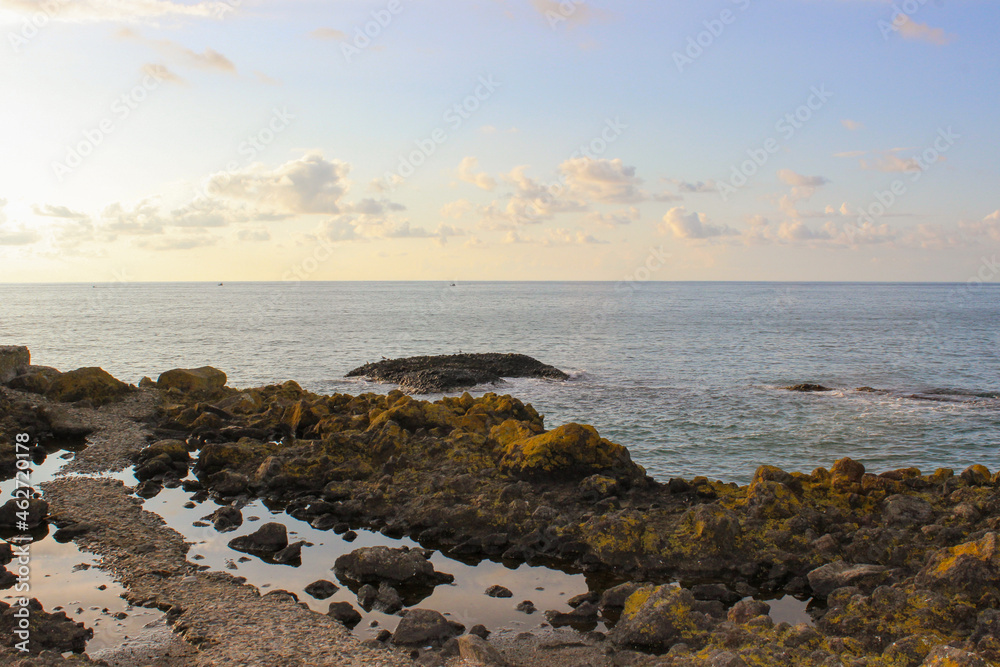 Sea and cloud with a rocky view