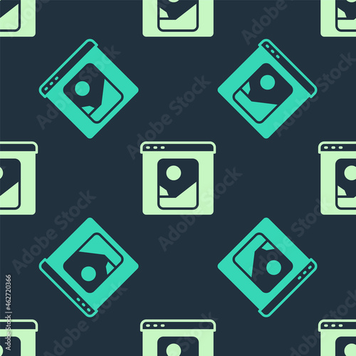 Green and beige Photo retouching icon isolated seamless pattern on blue background. Photographer, photography, retouch icon. Vector