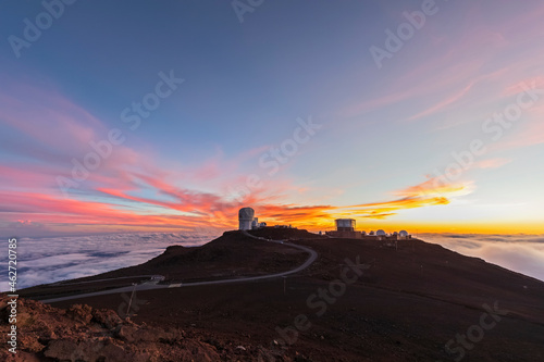 View from Red Hill summit to Haleakala Observatory at dusk, Maui, Hawaii, USA photo