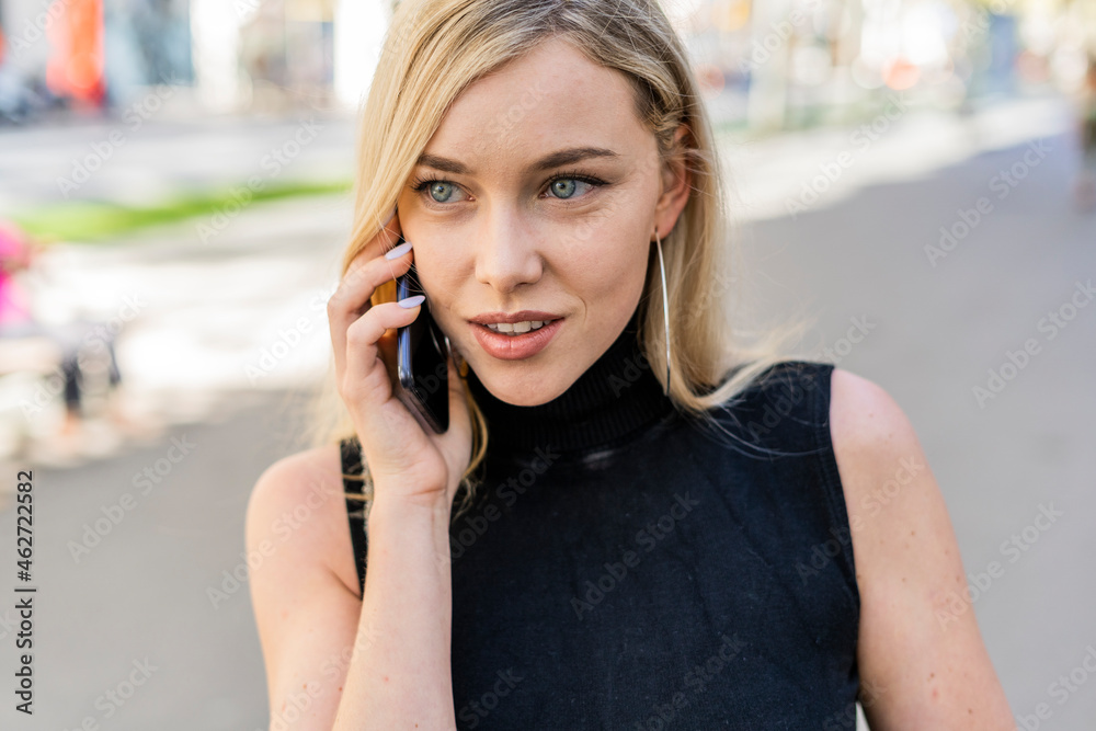 Portrait of blond woman on the phone Portrait of blond woman on the phone