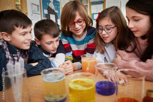 Group of children in a science chemistry lesson
