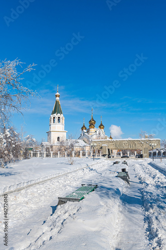 Russia, Republic of Sakha, Yakutsk, Snow-covered footpath leading to Yakutsk Orthodox Cathedral of Transfiguration of Jesus Christ photo