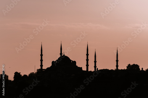 Epic Sunrise behind Mosque silhouette over Bosphorus, Istanbul, Turkey.