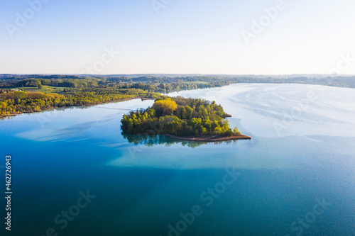 Germany, Bavaria, Inning am Ammersee, Drone view of clear sky over forested shore ofÔøΩWorth island photo