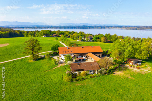 Germany, Bavaria, Munsing, Helicopter view of Weiler Luigenkam farmhouse in spring photo