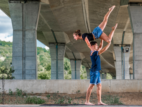 Young couple doing acrobatics