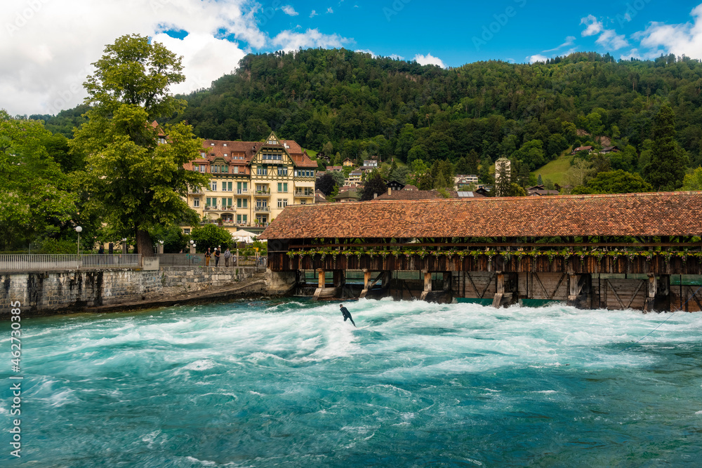 Bridge over Aare river against mountain in Thun, Switzerland Bridge over Aare river against mountain in Thun, Switzerland