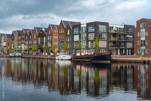 Netherlands, North Holland, Haarlem, Houses alongÔøΩSpaarneÔøΩriver canal photo