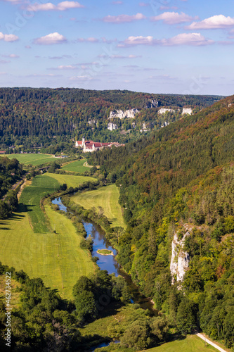 Germany, Baden-Wurttemberg, Beuron, Danube river flowing towards Beuron Archabbey seen from Knopfmacherfelsen photo