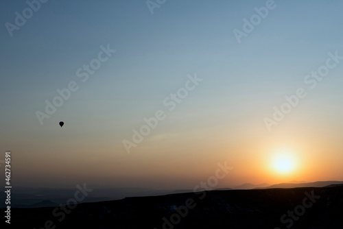 Hot air balloon flight during sunrise