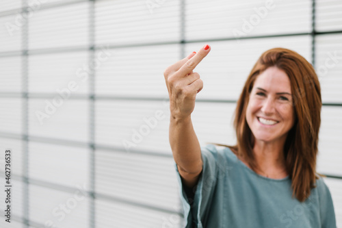 Female rebel giving the finger photo