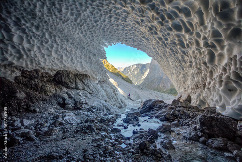 Germany, Bavaria, Berchtesgaden, Cave inÔøΩEiskapelleÔøΩsnowfield photo