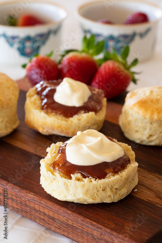 scones with strawberry jam and cream