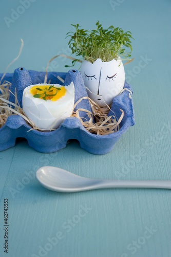 Easter decoration and breakfast egg in egg box photo