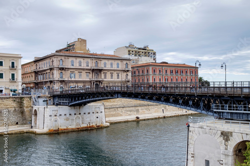 Italy, Province of Taranto, Taranto, Ponte Girevole bridge over city canal photo