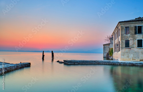 Italy, Punta san Vigilio, Lake Garda at sunset photo